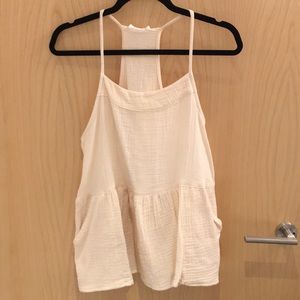 Adorable, light yellow babydoll top with pockets